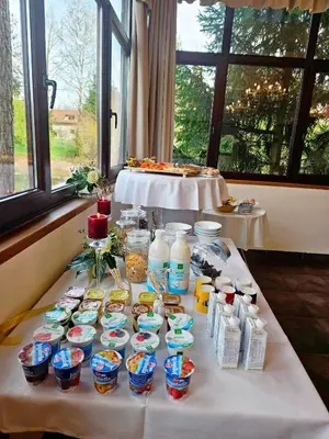 a table with food and drinks on top of it at Glamping Rajska vas in Šentjur