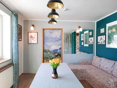 a living room with a couch and a table at Deerwood-Large Villa relax with castle view in Bled