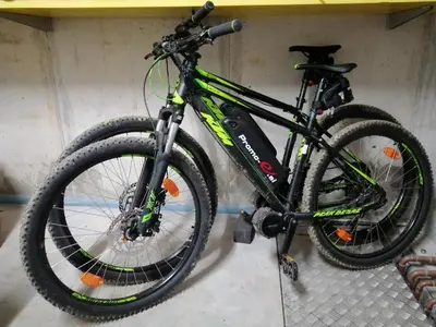 a bike is parked on a shelf at Apartments Maleric with Indoor Pool and Wellness in Dragatuš