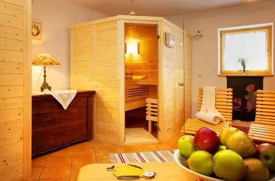 a room with a bowl of apples on a table at Farm Stay Pirc in Laško