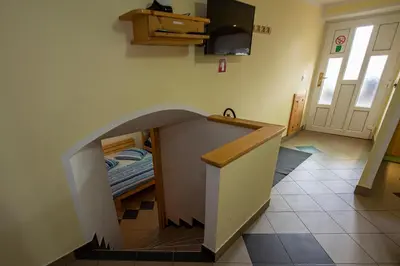 a room with a kitchen with a sink and a counter at Apartma Vidmar Otlica in Ajdovščina