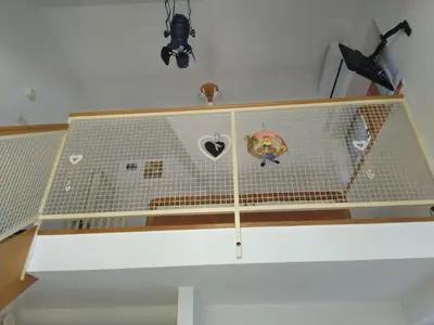 a net on the top of a staircase at Apartment Trobentica 40 Moravske Toplice - SPA in Moravske Toplice