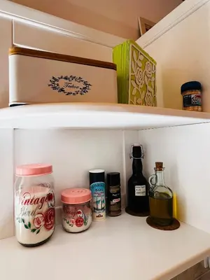 a refrigerator shelf with various items on it at Apartma Lip in Rateče