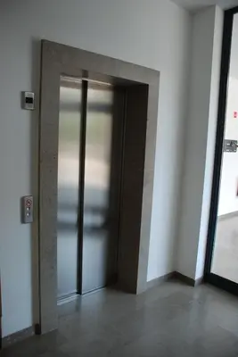an open elevator door in a building at Villa Magnolia in Ljubljana