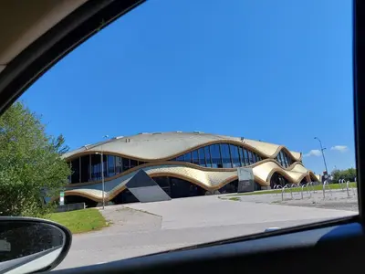 a view of a building from a car at ANERI in Ljubljana