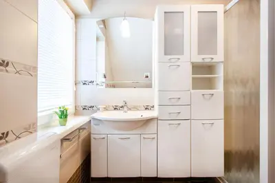 a white bathroom with a sink and a mirror at Orchid room for 2, Skylight room for 2 in Kranj