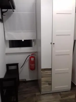 a room with a window and a fire hydrant at Apartma Lahinja in Gradac