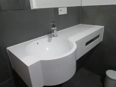 a white sink with a faucet in a bathroom at CARNIOLAN HOUSE - GORENSKA HIŠKA in Radovljica