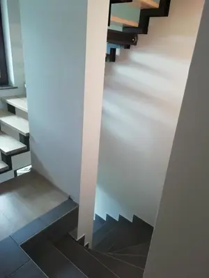 a view of a staircase in a house at CARNIOLAN HOUSE - GORENSKA HIŠKA in Radovljica