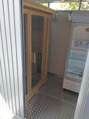 a glass door of a refrigerator in a house at Apartments Drevi in Ljubljana