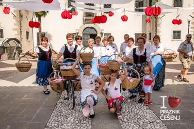 a group of children posing for a picture with baskets at Apartmaji Kumar in Šmartno