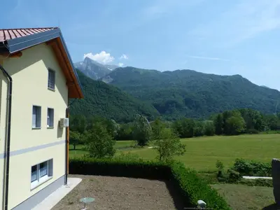a view of the mountains from a house at HišaŠmihelka in Kobarid