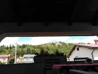 a view from a window of a house at Jasna rooms in Ilirska Bistrica