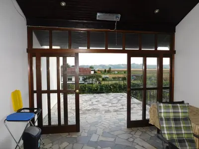 an open door to a patio with a view at Haus Videm in Videm pri Ptuju
