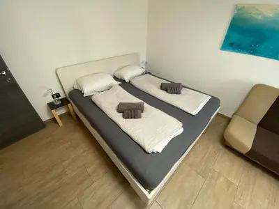 two beds in a small room with at Castle View in Tolmin