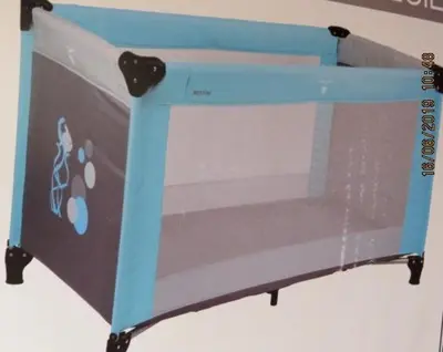 a bed with a blue frame with a drawer at Sunlight Apartment in Bled