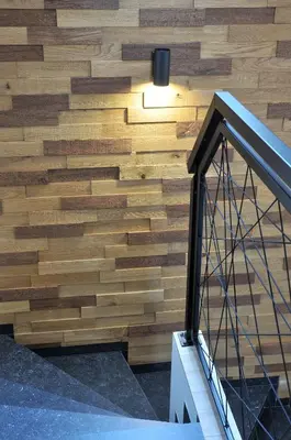 a wooden wall in a building with a staircase at Brand new house Luna in Bled