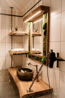 a bathroom with a sink and a mirror at Mama Mia Apartments in Radovljica