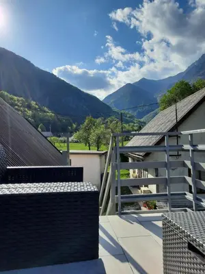 a view from the roof of a house with mountains in the background at APARTMA BENY with SAUNA in Žaga