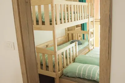 a bunk bed room with two bunk beds at Ski and Bike Apartment Rušovc in Kranjska Gora