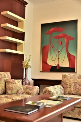 a living room with two couches and a table at Vila Ključe Apartments in Bled