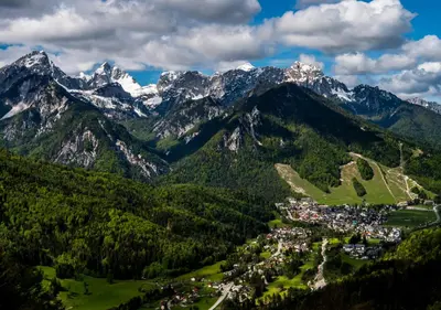 an aerial view of a town in the mountains at Klass 103 in Kranjska Gora