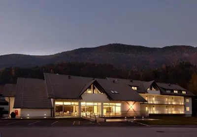 a large building with a lot of windows at Klass 103 in Kranjska Gora