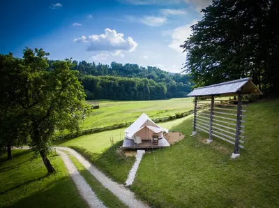 an aerial view of a tent in a field at PUŽMAN Farm Glamping in Radovljica