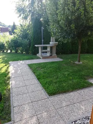 a park with a picnic table in the grass at Brunarica Lorentia in Bizeljsko