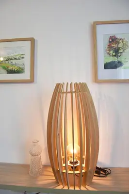 a lamp sitting on top of a table at Lesnavesna designer Apartment with a garden in Visoko