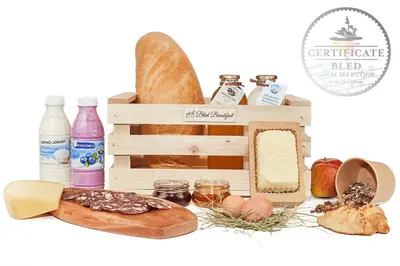 a crate filled with bread and other food items at Studio ELITE in Bled