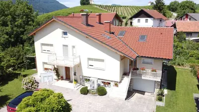 an aerial view of a white house with a red roof at Apartment Venko in Slovenske Konjice