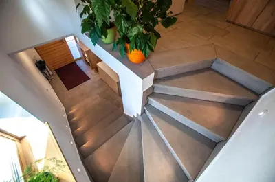 an overhead view of a staircase in a house at Apartments Izvir in Bohinj