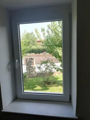 a window with a view of a yard at Charming house 
