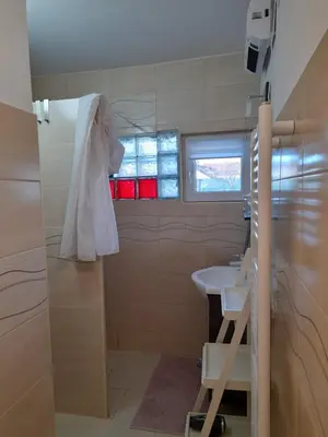 a bathroom with a sink and a window at Charming house 
