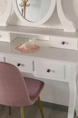 a white dressing table with a mirror and a chair at Family Apartment NAKITEYA in Ljubljana