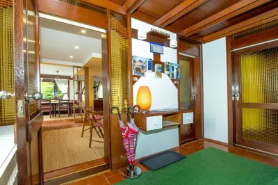 a room with a door and a dining room at Gorgeous Chalet in Bled