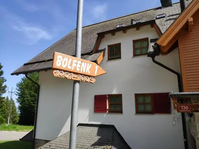 a street sign in front of a building at Antela appartments for up to 5 person on Mariborsko Pohorje in Pohorje