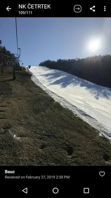 a view of a snow covered slope with a ski lift at Antela appartments for up to 5 person on Mariborsko Pohorje in Pohorje