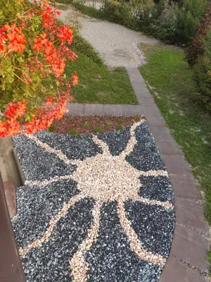 a garden with a star drawn on the ground at Sunrise Home in Maribor