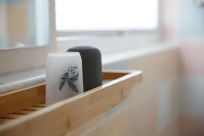 a coffee mug sitting on a wooden shelf at Apartment Nobl plac in Celje