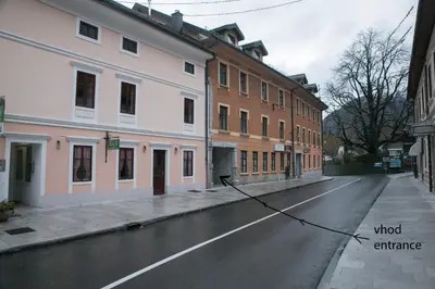 an empty street in a city with buildings at Apartma Verdi Bc in Bovec