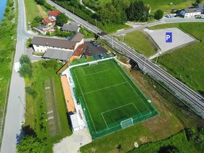 an aerial view of a tennis court on a field at Rooms at Trimček in Sevnica