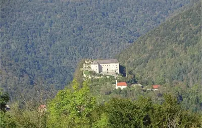 a house on a hill in the middle of a mountain at 4 Bedroom Lovely Home In Kostel in Kupa