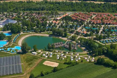 an aerial view of a park with a lake at Mediteran Travel Mobile Homes in Camping Terme Čatež in Brežice