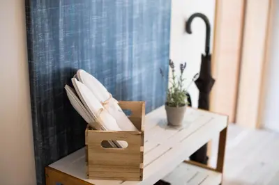 a white table with a box of pillows on it at ALEX BUMBLEBEE in Bled