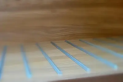 a close up of two steps on a wooden keyboard at Pension Patrik in Hrušica