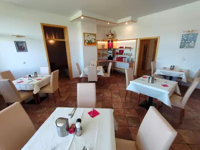 an overhead view of a restaurant with tables and chairs at Pension Patrik in Hrušica