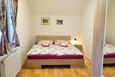 a bedroom with two beds in a room at Jacobs Resort 4 Bedroom Private House in Kranjska Gora