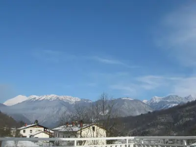 a view of a mountain with snow covered mountains at Guesthouse Sobe Silva in Tolmin